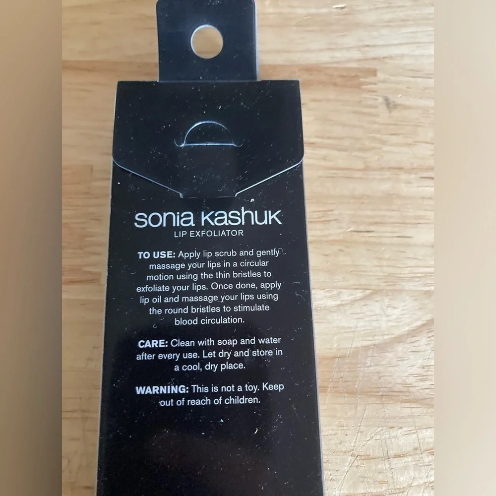 Sonia Kashuk lip exfoliator. Pink in color. New in box